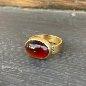 Hessonite + teal diamond ring