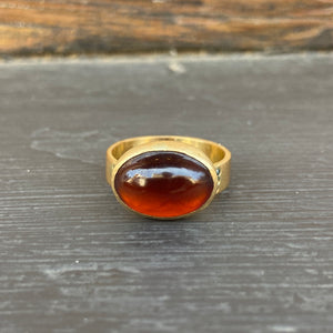 Hessonite + teal diamond ring